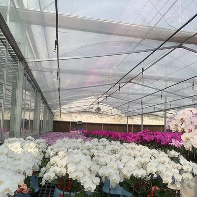 Serre d'éclairage contrôlée par pulvérisateur à eau à double couche pour les solutions de plantation